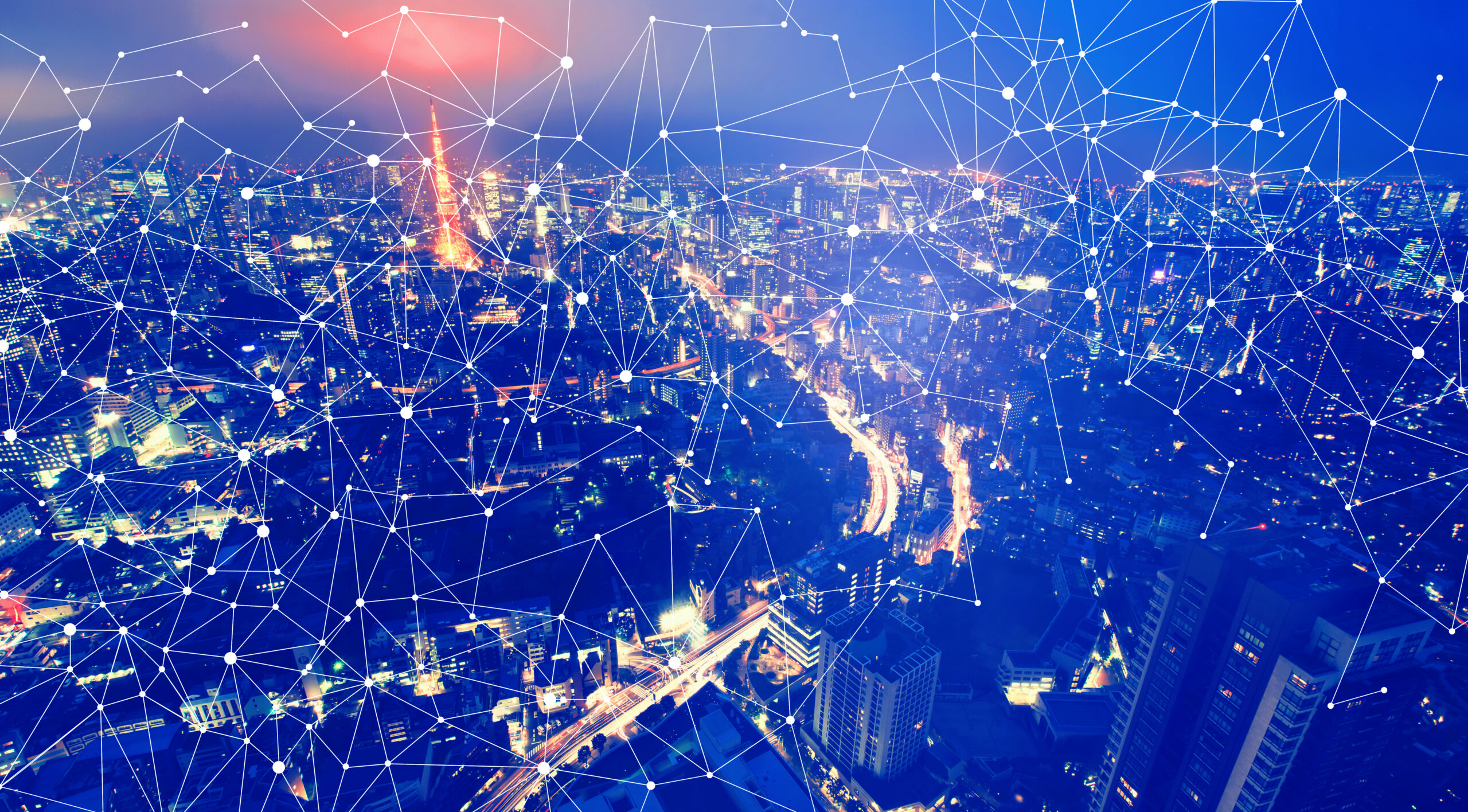 Connected cityscape with digital network overlay representing data-driven forecasting and interconnected business systems